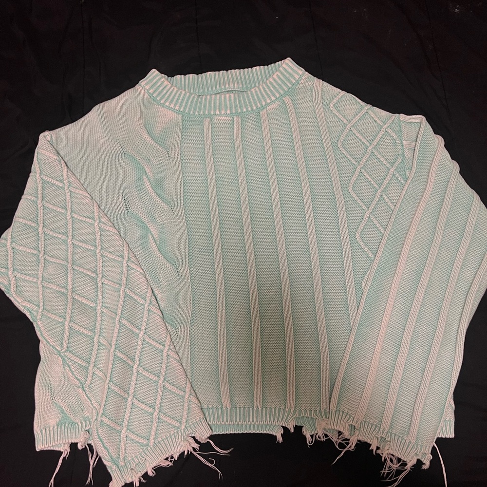 Oversized green knitted distressed sweater